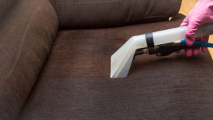 microfiber couch being professionally cleaned